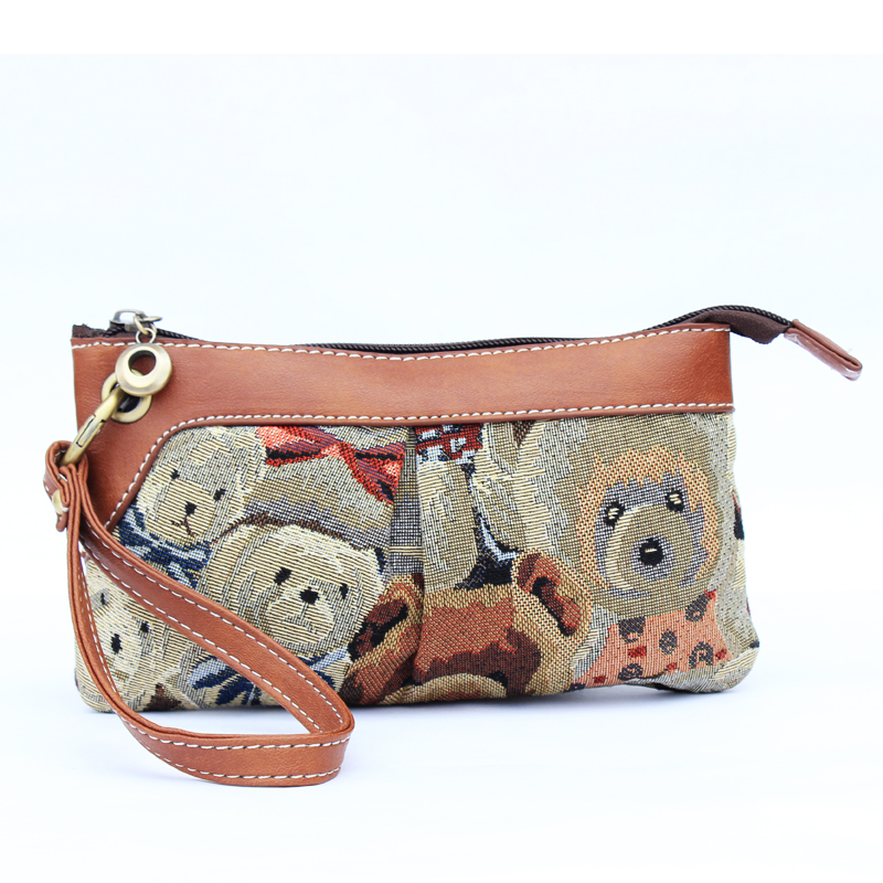 丹尼比伯 包包2014新款 女  手拿包 泰迪熊帆布手机包 铁环手拿包