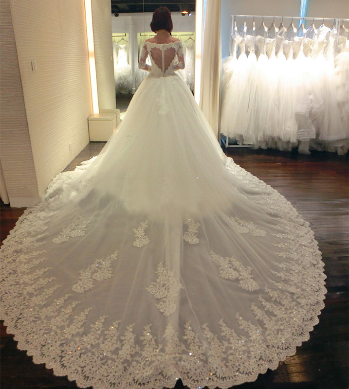 2015新款新娘婚纱夏韩版修身蕾丝一字肩长袖心形露背大拖尾婚纱廋